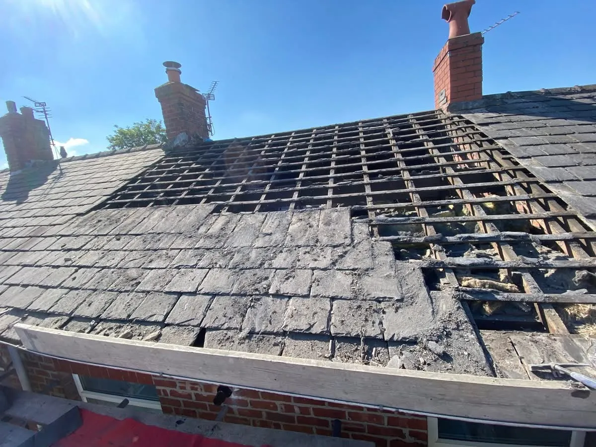Slate roof stripped back to the battens