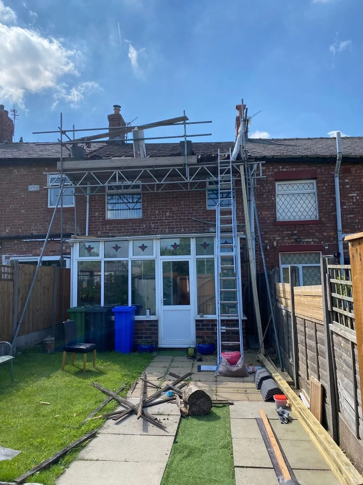 Scaffold up for roof work on a terraced house