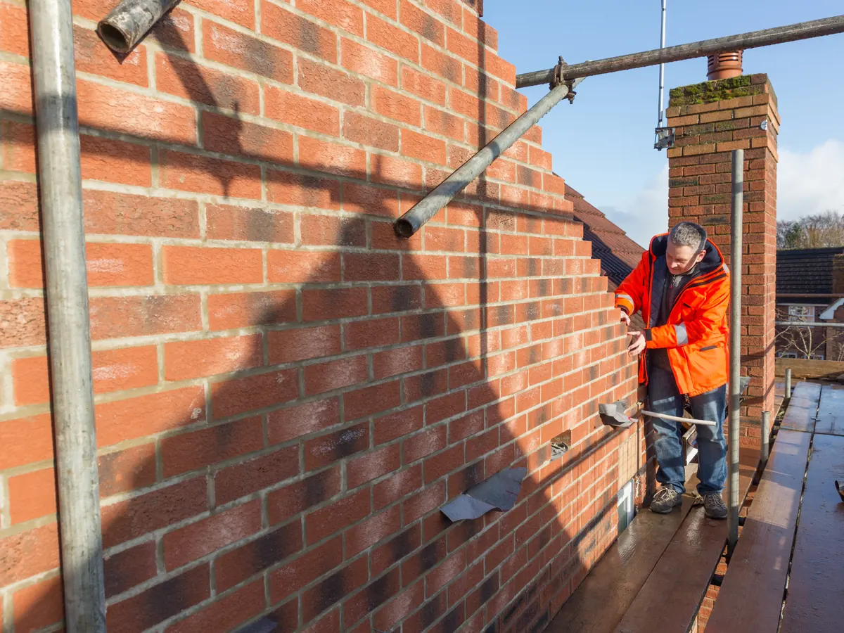 Close view of chimney repointing & repairs work in progress